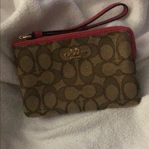Signature coach wristlet